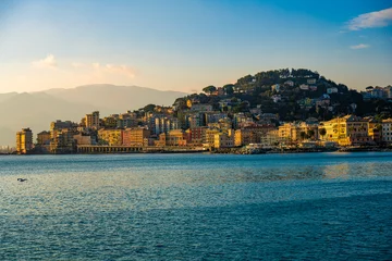 Fotobehang Golden Light on Pegli - Coastal Townscape at Dusk, Genoa, Italy © Emad Aljumah