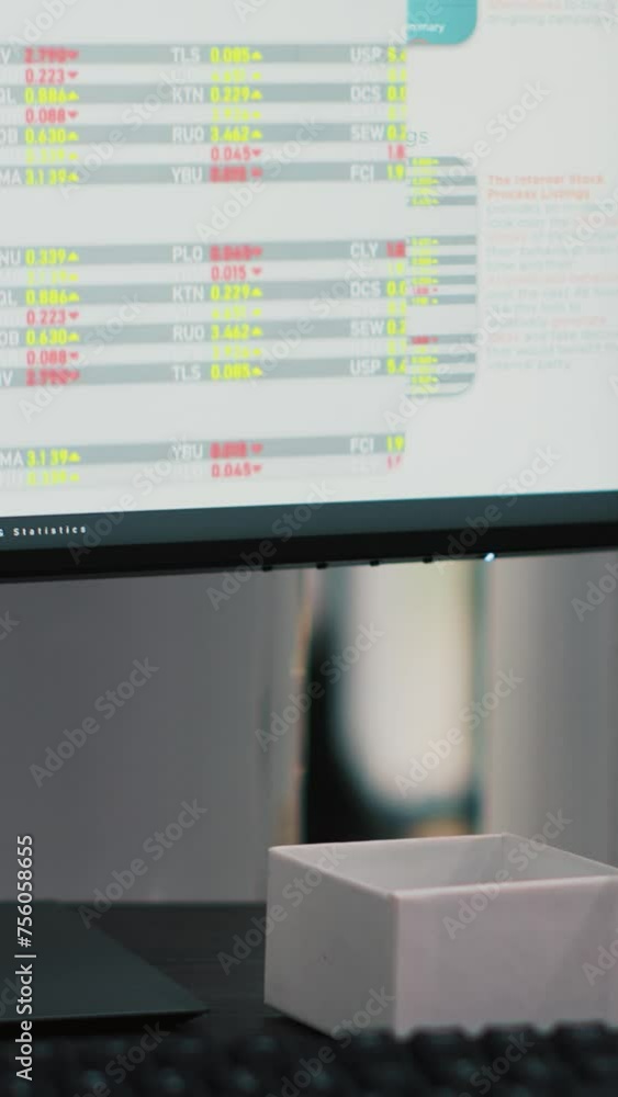 Poster vertical video market index listings values going up and down on computer monitor, price volatility 