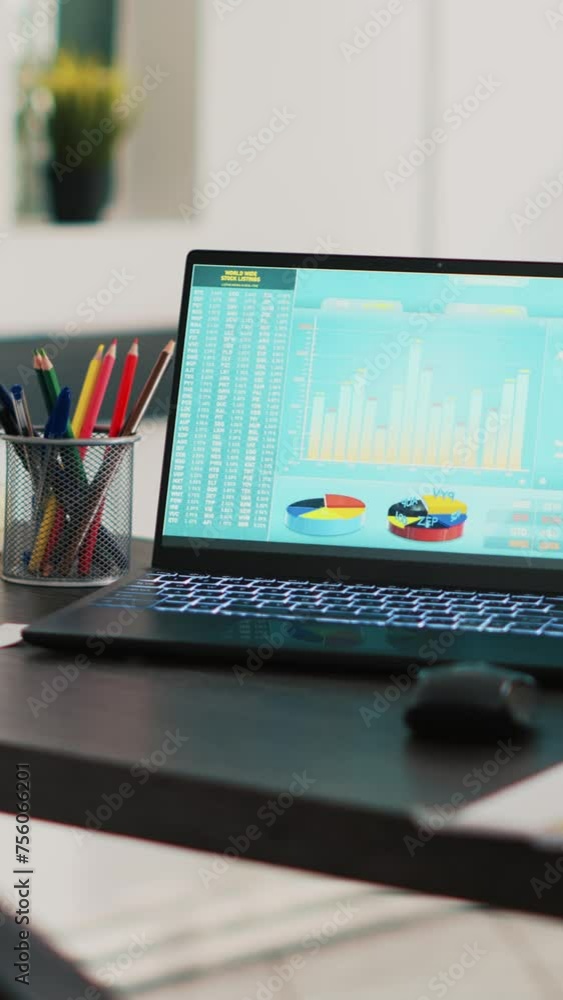Poster vertical video financial stock market diagrams with charts and stock figures on laptop showing profi