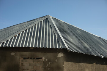 Fototapeta na wymiar Steel roof. Roof of building. Steel profile.