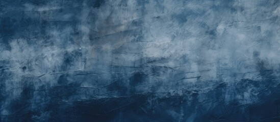 Fototapeta premium A closeup of an electric blue wall with a cloudy sky in the background, creating a freezing horizon. The cumulus clouds form a beautiful pattern against the natural landscape