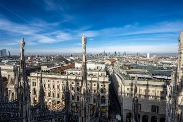 Fototapete Rund Aerial View of Milan with Statues Overlooking the City from Duomo di Milano, Italy © Emad Aljumah