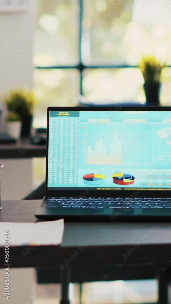 Poster vertical video stock market diagrams with charts and stock figures on laptop showing profits, empty 