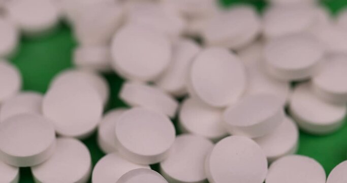 white pills close-up for medical care , unpacked white pills