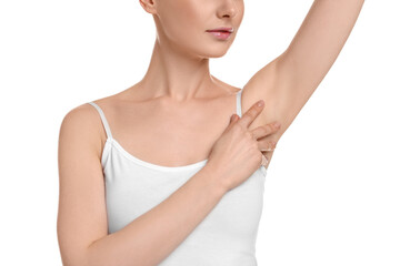 Obraz na płótnie Canvas Woman showing armpit with smooth clean skin on white background, closeup
