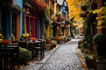 Colorful buildings along a cobblestone street with outdoor seating