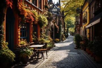 Charming street lined with tables and chairs in a quaint neighbourhood - obrazy, fototapety, plakaty