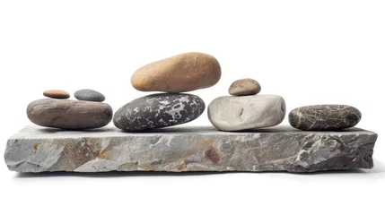Tuinposter Balanced stack of multi-shaped and multi-colored stones on solid rock base, symbolizing stability and harmony in Zen principles. Zen and balance in nature. © Postproduction