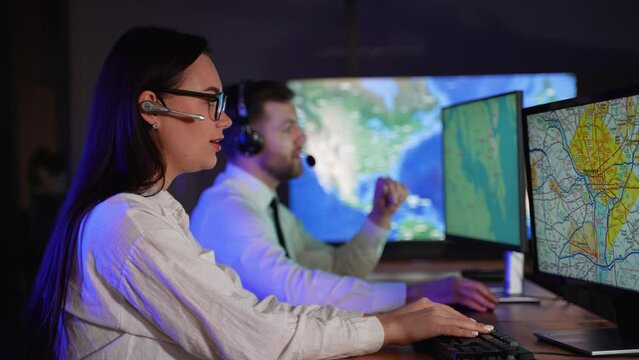 Transport call operator in headphones discussing the route with the customer