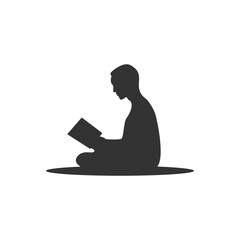 Silhouette of man reading a book