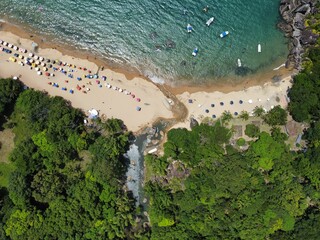 aerial photo of paradisiacal blue beach with clear sand