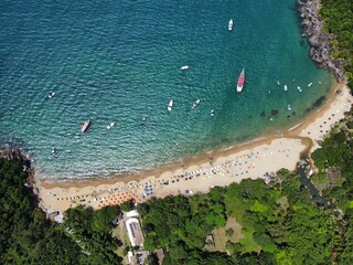 aerial photo of paradisiacal blue beach with clear sand - obrazy, fototapety, plakaty