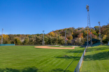 Fall colors on the hillside by Jordan Minnesota community baseball field