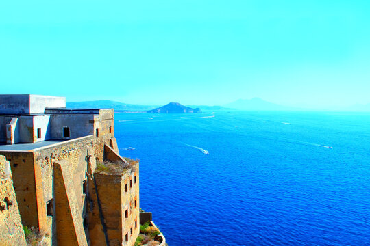 ISOLA DI PROCIDA, ITALY - SEPTEMBER 10, 2023: Palazzo d'Avalos and Tyrrhenian Sea. It was built by Cardinal Innico d'Avalos to fortify the island, which had been marred by raids of Saracen pirates