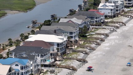 South Carolina coastline beach with vacation beach houses at Litchfield seaside living in low...