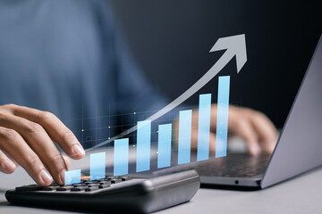 Businessman use laptop to analyzing growing chart for showing successful increase in business...
