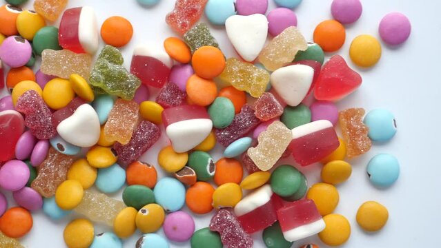 colorful candy sweet jelly in a bowl on table 