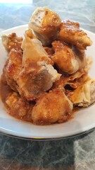 Batagor siomay Bandung, is a street food that is very popular in Indonesia, is one of the local foods usually served with tofu, fish cake, boiled potato and egg, peanut sauce.