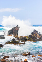 Sea waves hitting rocks near Hookipa Beach, Maui, Hawaii