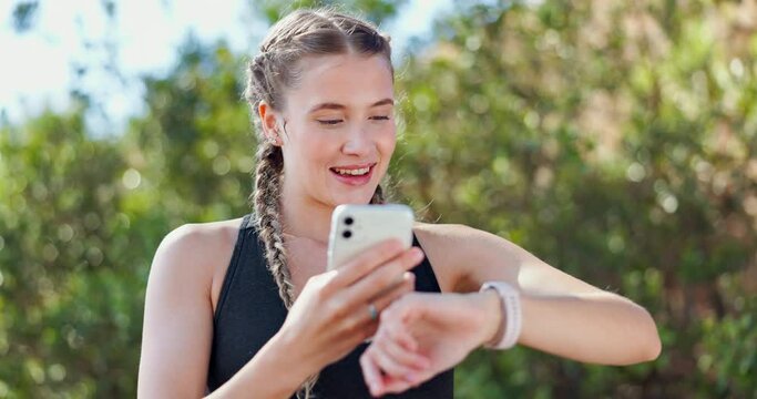 Smile, woman and smartphone with watch for exercise, tracking time and happiness for achievement. Athlete, fitness and technology outdoors for cardio, heart rate or check for progress in nature park