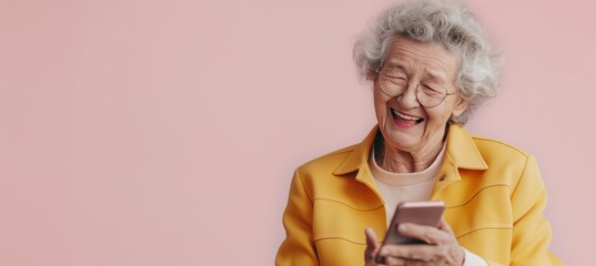 Smiling senior woman using mobile phone. Portrait of happy elderly lady looking at mobile phone screen. Copy space