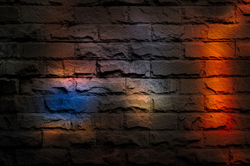 colourful spotlight on brick wall