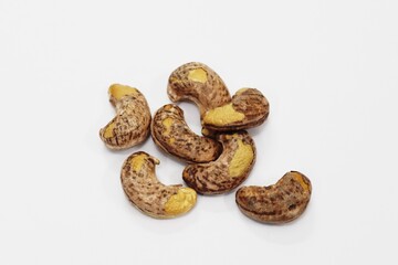 Roasted cashew nuts, isolated white background