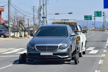 Tow Truck Towing a breakdown car