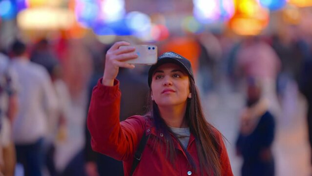 Young woman taking photos in Downtown Las Vegas - travel photography