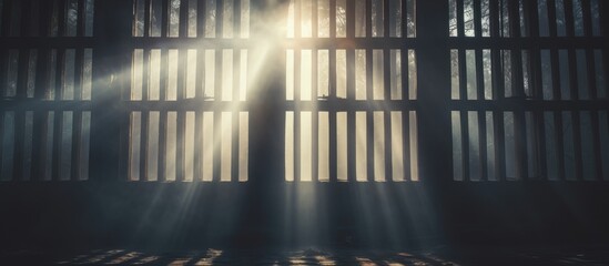 Light passing through a foggy window with bars