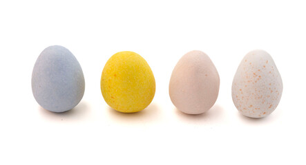 Mini Multicolored Candy Coated Chocolate Easter Eggs Isolated on a White Background