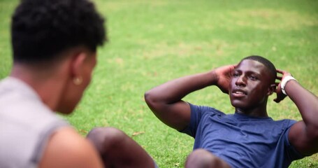 Sit ups, exercise or workout with man and personal trainer outdoor in field together for performance. Fitness, sports or training with athlete and coach in garden for health or physical activity