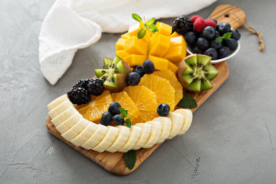 Fruit plate with berries, mango and kiwi