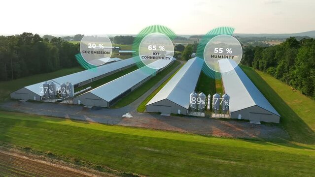 Chicken houses with overlay of data graphics on CO2, humidity, and IoT connectivity. Aerial of futuristic farming in USA with data metrics animations.