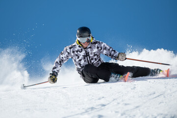 Expert skier on the slopes of Grandvalira in Andorra in Winter 2024