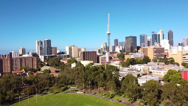 Slow aerial move in shot on construction crane in East Perth, Australia with CDB buildings in background