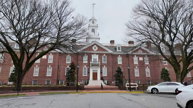 Delaware state capitol building Dover legislative hall slow walk to fron of building cloudy winter day