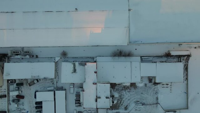 Flying Above Buildings In Winter In Dabrowa, Gdynia, Poland. aerial topdown shot
