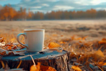Raamstickers cup of hot tea in Autumn background © Hamza