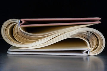 Hardcover notebook, with opened and rolled pages - 756186493
