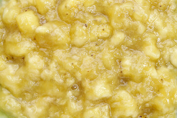 Mashed banana texture, close up