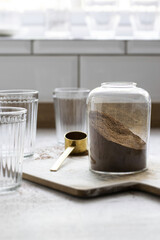 Fototapeta na wymiar Ground coffee in a glass container