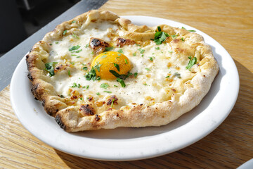 pizza with an egg