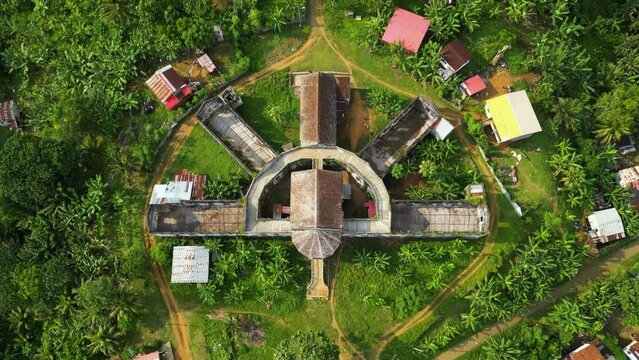 Top down drone shot above the Old Hospital in Ro&ccedil;a Agua Iz&eacute;, sunny Sao Tome