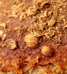 Sesame seeds on the crust of bread. Macro - 756204897