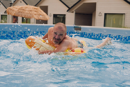 A man having fun in a pool