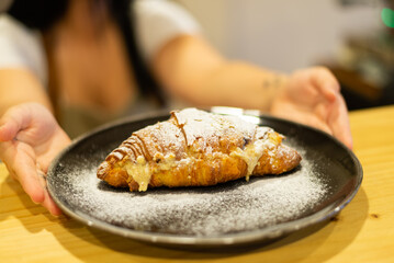 Obraz na płótnie Canvas Special croissant with almond and sugar
