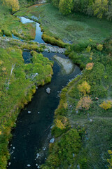 looking down at stream in the Manitoba landscape in late summer