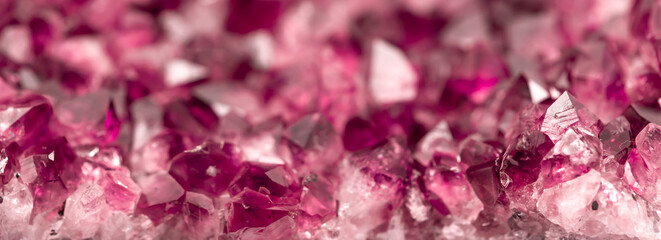Amethyst garnet crystals. Burgundy gemstone. Mineral crystals in the natural environment. Texture...