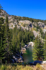 Secluded Lake Martha Nestled in Granite Cliffs and Evergreen Forests